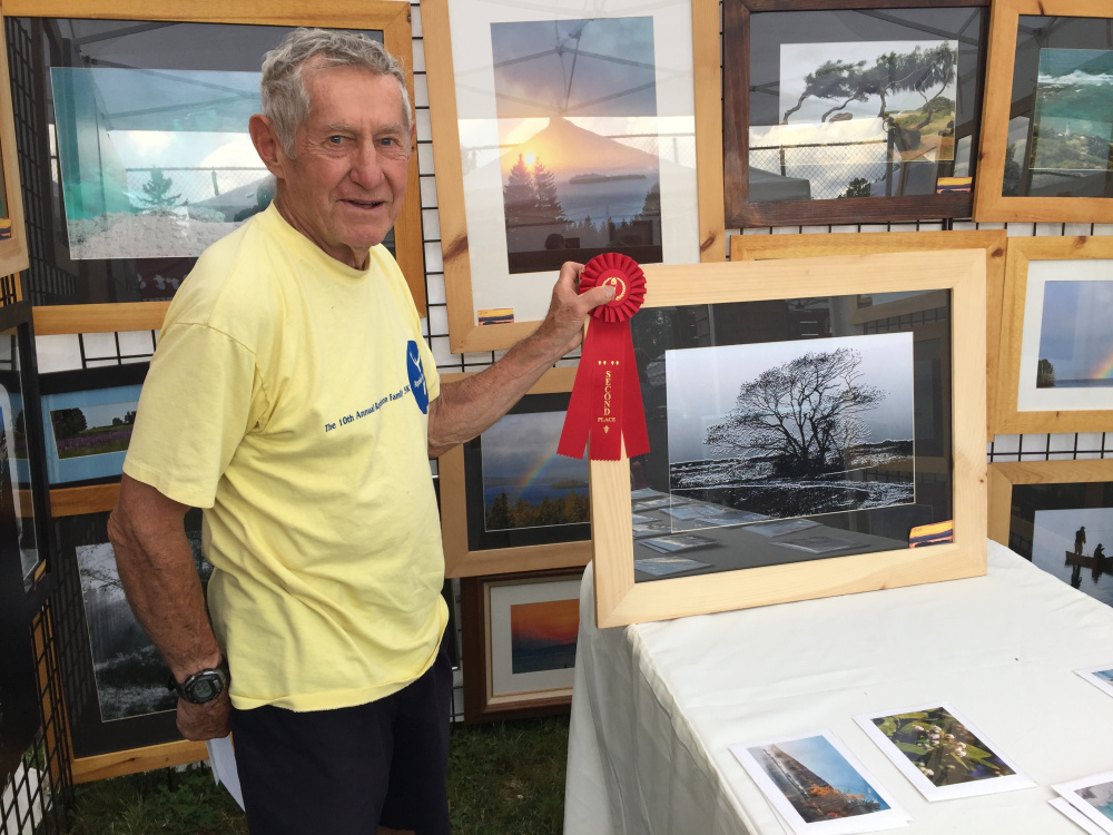 Contributed photoWalter Mularz placed secon in the 2-D category at the Art in August artists and artisans exhibition in Oquossoc Park on Aug. 3.