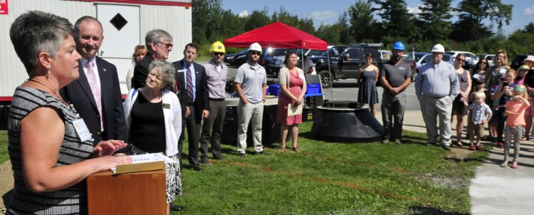 Kennebec Montessori Head of School Rebecca Green and other officials address parents and students during a groundbreaking ceremony for the USDA financed expansion project at the Fairfield school Thursday. Beside Green is Tom Higgins of the Maine USDA office.