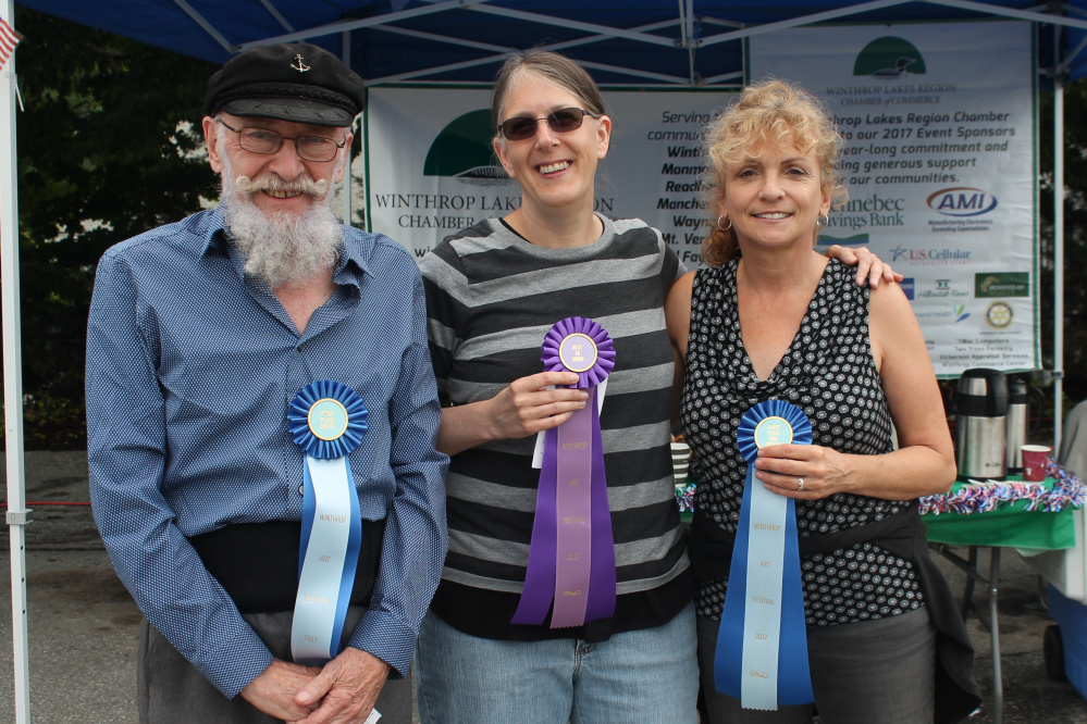 The 30th Annual Winthrop Sidewalk Art Show winners, from left, are Marvin Jacobs, of Belmont, Janyce Boynton, of Old Town, and Diane Harwood, of Winthrop.