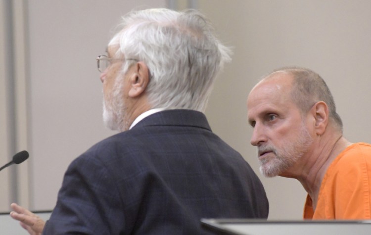 Robert Lonardo, right, speaks Monday with his attorney, Andrews Campbell, during a hearing to appeal Lonardo's life sentence for the 1994 murder of Marianne Pembrook.