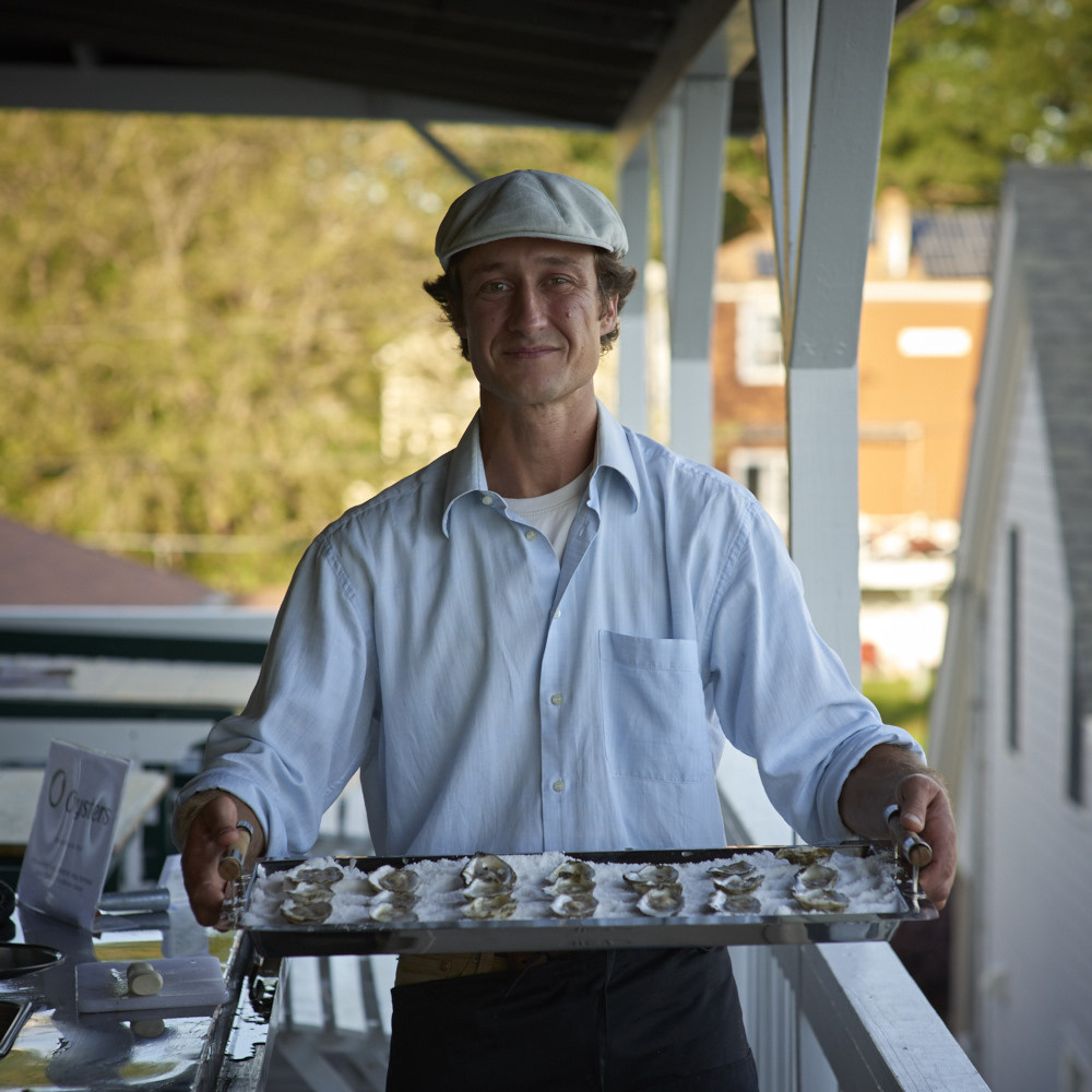 Lucas Myers and his mobile shucking station bring O'Oysters to the Village during the Wiscasset Art Walk on Thursday, Aug. 31.