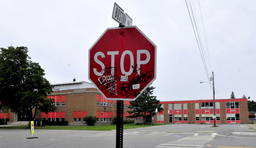 Graffiti appears Wednesday on a stop sign at the end of Boston Avenue near Winslow Junior High school in Winslow.