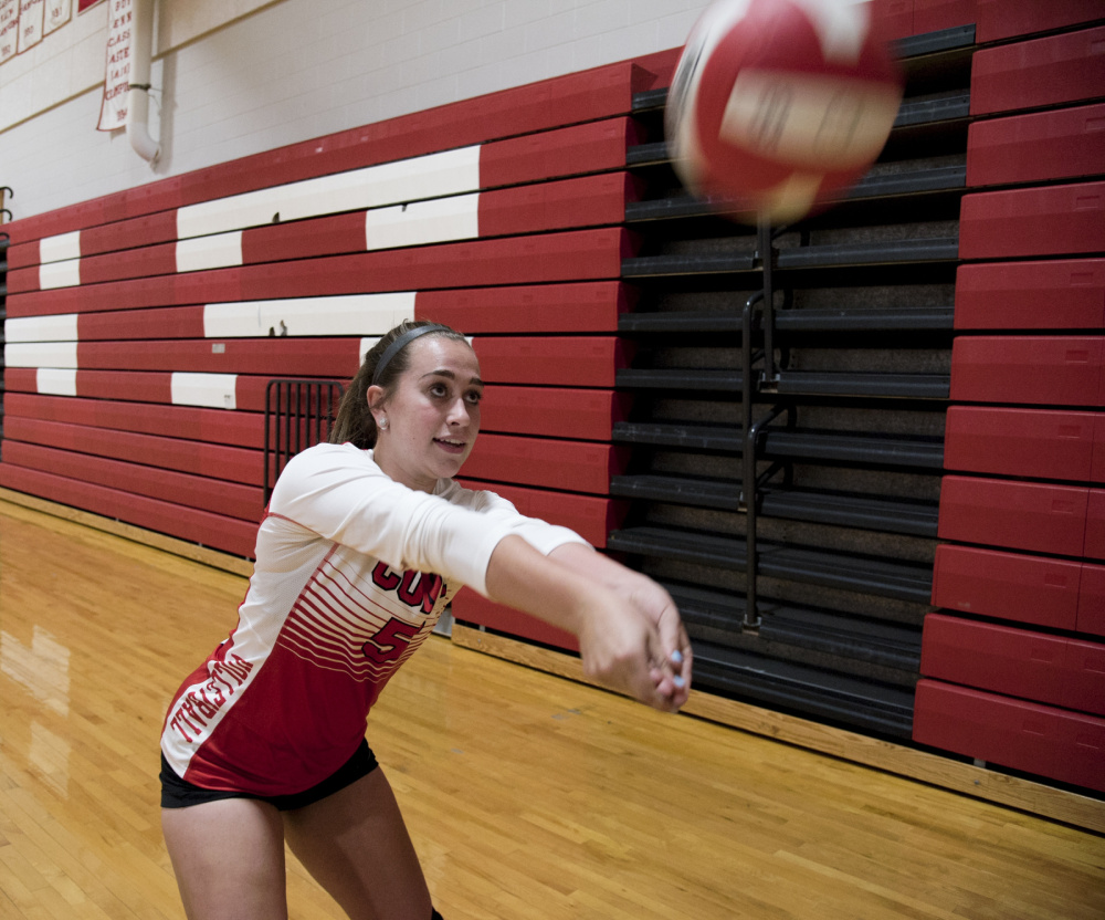 Cony volleyball player Sarah Caron practices before a scrimmage against Brewer on Monday night in Augusta.