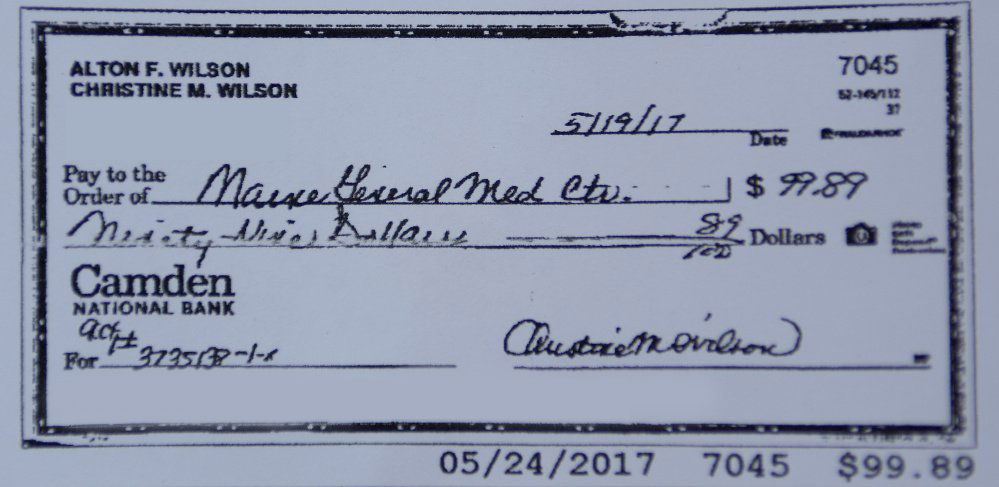 A copy of a check sent to MaineGeneral Medical Center that has been edited to block out identifying information is shown in this photo taken on Wednesday.