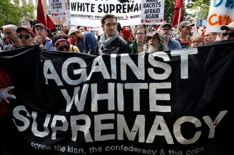 A group of counter-protesters rally against members of white nationalists in Charlottesville, Virginia on August 12, 2017.   