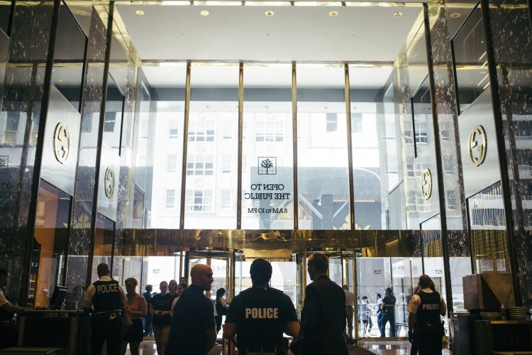 A strong police presence is visible in Trump Tower on Thursday. The Secret Service command post has moved out of the tower and into a trailer on the sidewalk in a lease dispute with the Trump Organization.