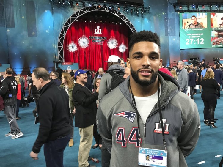 Trevor Bates, shown during opening night ceremonies at the Super Bowl in Houston in February, was cut Saturday by the Patriots but is expected to be added to their practice squad.