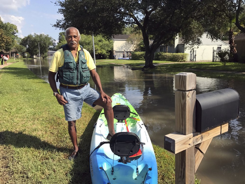 Gordon Prendergast's new kayak allows him to see how his house is faring after his Houston neighborhood was evacuated. He remembers when wilderness, not homes, marked the area.