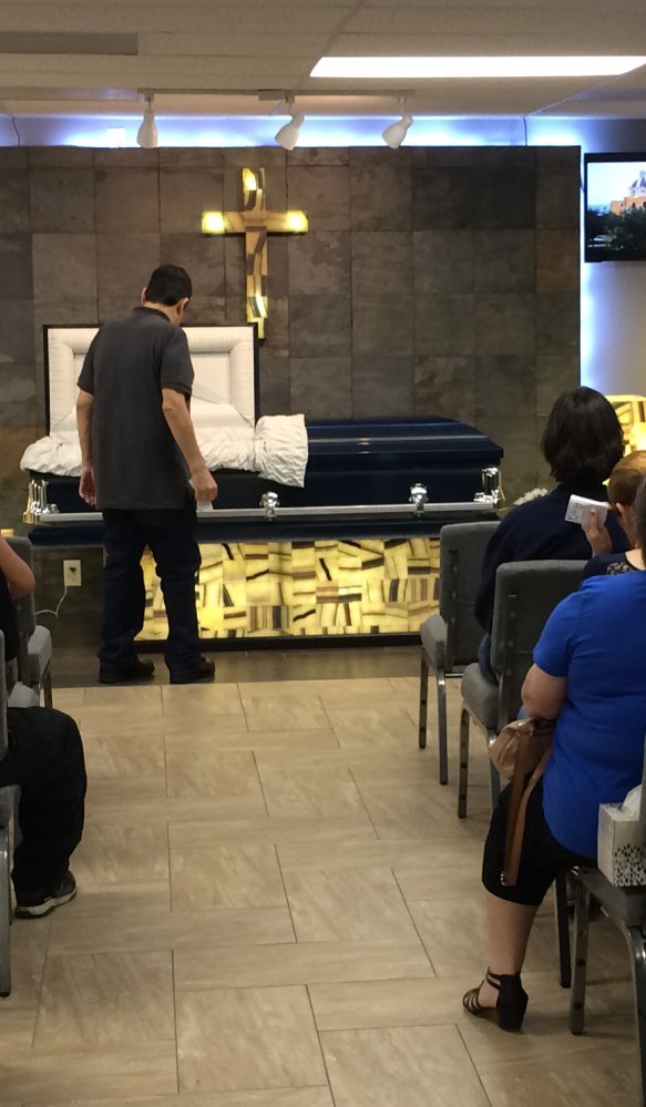 Mourners gather Friday for Harvey victim Benito Juarez Cavazos at Del Pueblo Funeral Home in Houston, days after the 42-year-old man was found dead amid receding floodwaters.