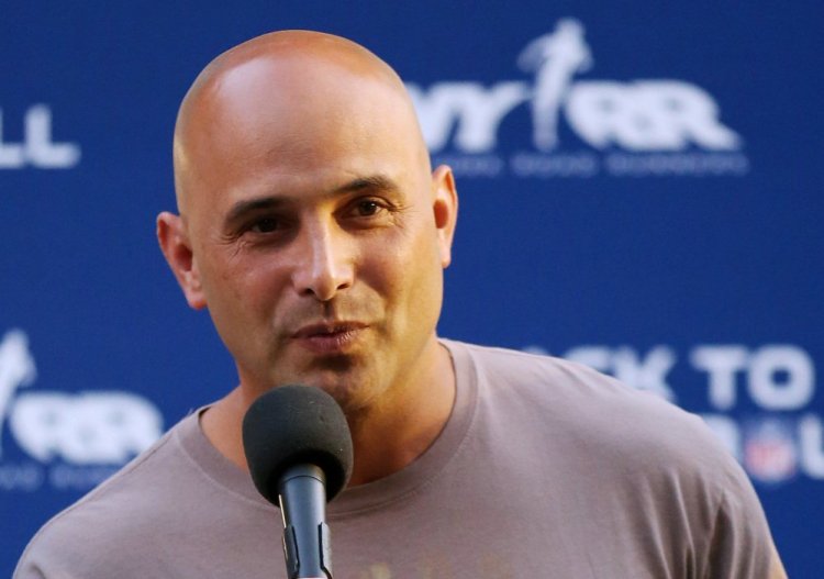 Craig Carton, who hosted a radio show with former NFL quarterback Boomer Esiason, has been charged with fraud.