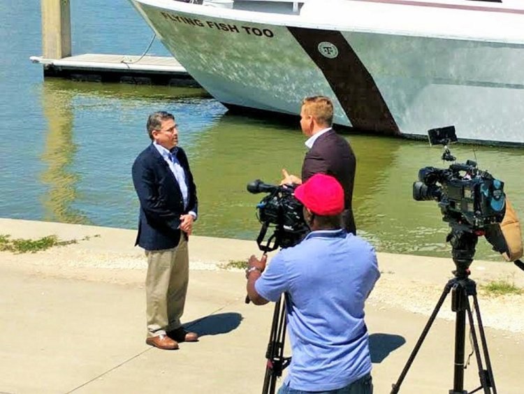 An ABC news crew interviews Sam Brody following  flooding about a year ago. The Texan with Maine ties has been “cajoling people for the last 10 years” about coastal sustainability. 