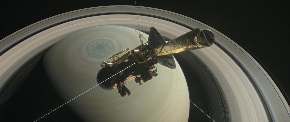 The spacecraft Cassini is pictured above Saturn's northern hemisphere prior to making its grand finale dive Friday in this NASA handout illustration obtained by Reuters.