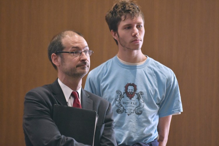 Orion Krause, right, stands with his attorney, Edward Wayland, at Krause's arraignment in Ayer District Court on Sept. 11, 2017. Krause was found competent to stand trial.