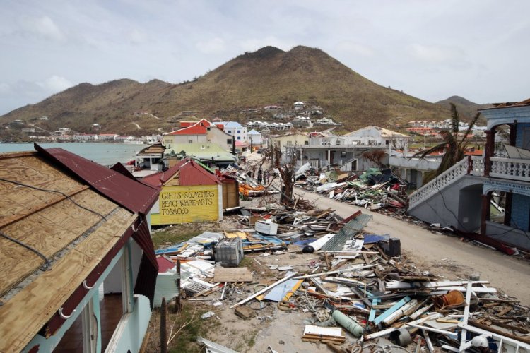 Hurricane Irma heavily damaged buildings along the shore of St. Maarten, and homes were leveled in the neighborhood of Lisa MacVane of Raymond, including her own. "It was completely torn down," said MacVane, a medical student who took shelter in a building on campus.