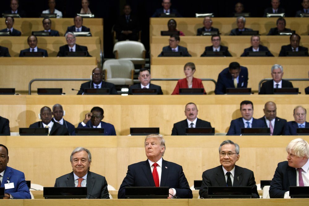 President Trump participates in a photo shoot before the beginning of the "Reforming the United Nations: Management, Security, and Development" meeting during the United Nations General Assembly on Monday at U.N. headquarters.
