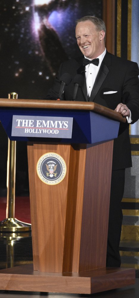 Former press secretary Sean Spicer speaks at the 69th Primetime Emmy Awards on Sunday at the Microsoft Theater in Los Angeles.