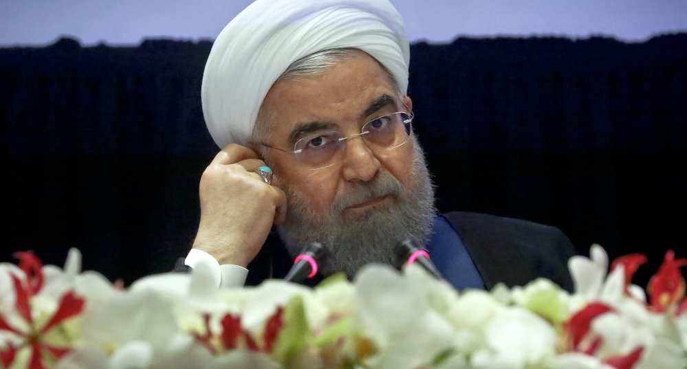 Iran's President Hassan Rouhani listens at a news conference during his visit for the United Nations General Assembly, Wednesday Sept. 20, 2017, in New York. President Donald Trump said he has made a decision on whether to walk away from the landmark 2015 nuclear deal with Iran but refused to say what it is, setting the stage for a particularly contentious meeting of the parties to the agreement. (AP Photo/Bebeto Matthews)