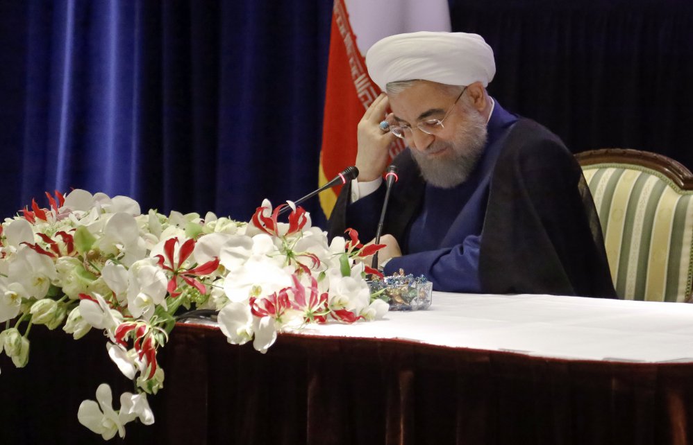 Iranians President Hassan Rouhani listens during a news conference about his visit to the United Nations General Assembly on Wednesday in New York.