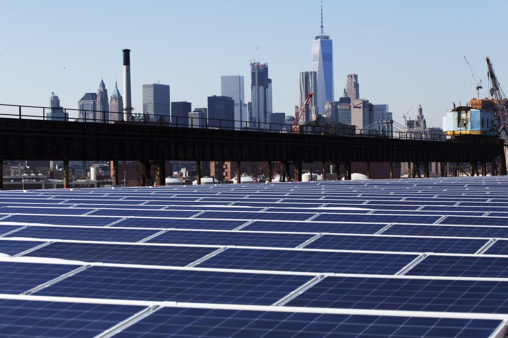 This February photo shows solar panels at the Brooklyn Navy Yard in New York. Solar panels imported from China and other countries have led to a boom in the U.S. solar industry, where rooftop and other installations have surged tenfold since 2011.