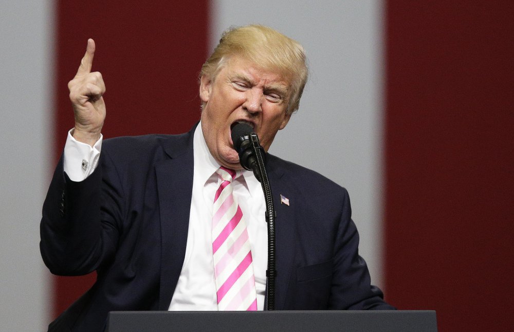 President Trump speaks at a primary rally in support of Sen. Luther Strange on Sept. 22 in Huntsville, Ala. Trump waded into the controversy surrounding NFL players kneeling for the national anthem to protest police violence against black Americans and other forms of discrimination.