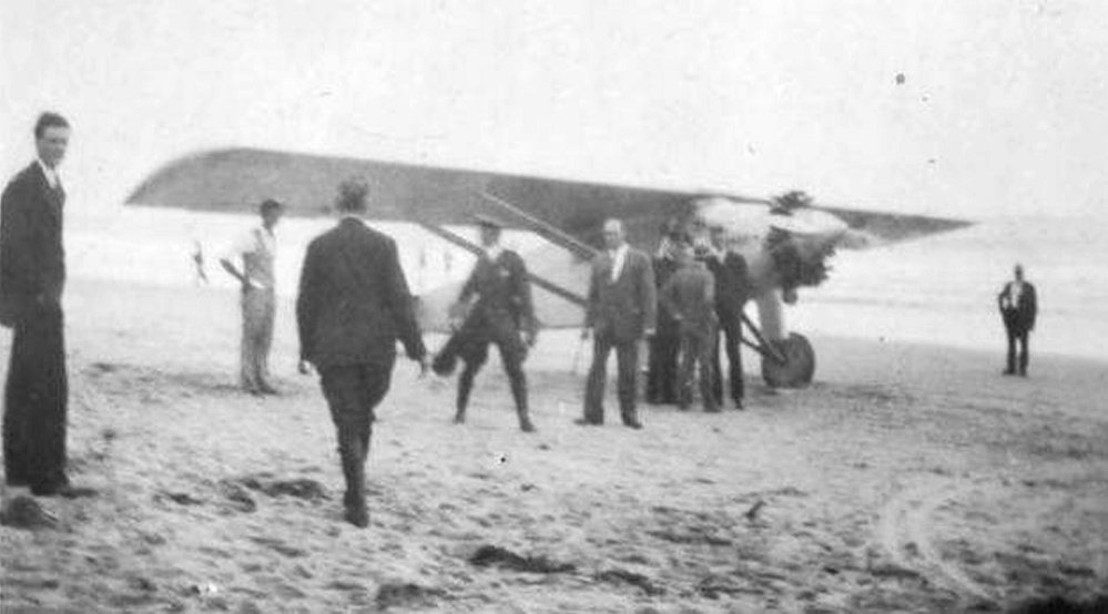 After his historic trans-Atlantic flight, Charles Lindbergh was headed for the Portland airport on July 24, 1927, as part of his victory tour when fog forced him to find another landing spot. He was aware of a hangar in Old Orchard Beach and landed on the sand nearby.