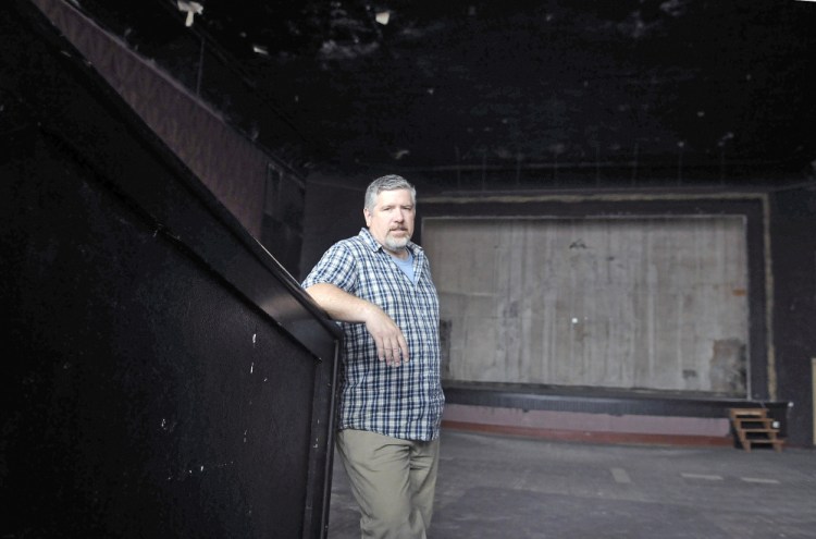 Mike Miclon stands in the main theater of Johnson Hall in Gardiner in September 2016. The theater is working to raise an estimated $4.8 million for renovations.