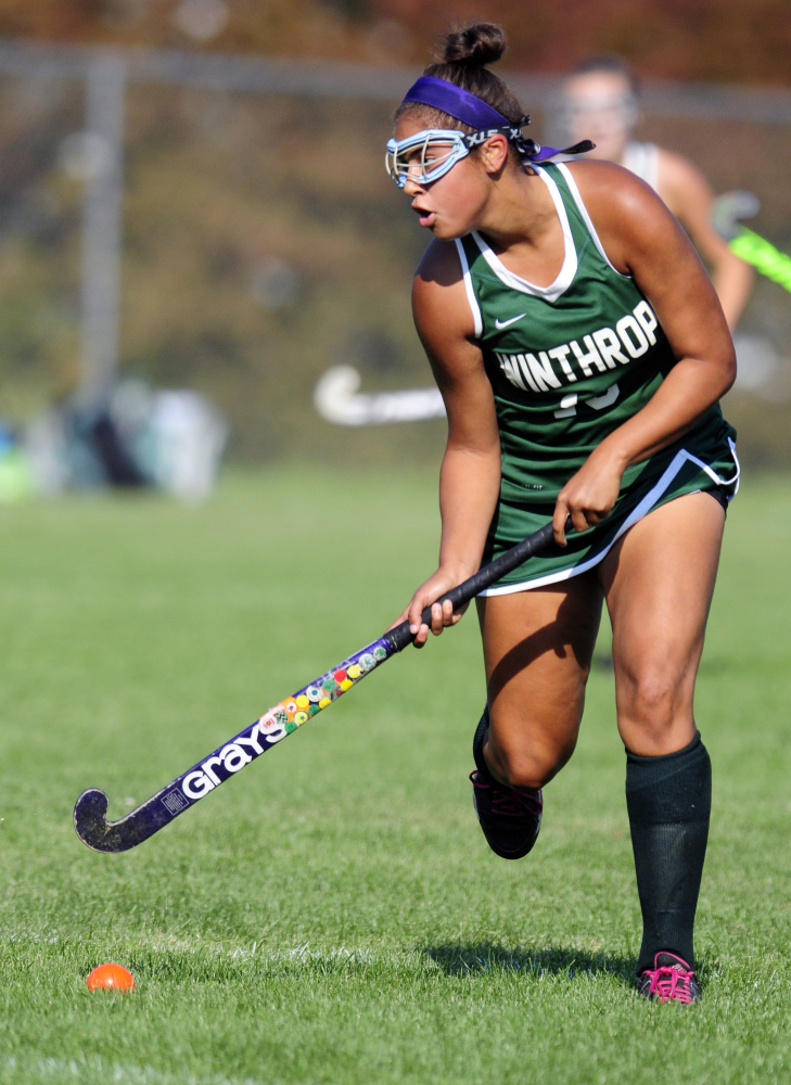 Winthrop's Breonna Feeney moves down field during a game Monday against Oak Hill in Litchfield.