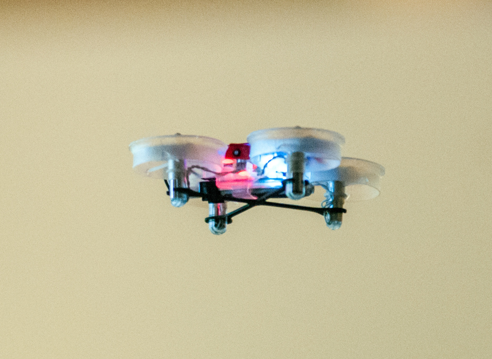 A small training quadcopter drone flies on July 28 in the Fireplace Lounge in Randall Hall on the University of Maine at Augusta campus.