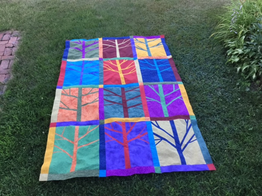 The handmade quilt, made by the Seam Rippers of South China, will be raffled Oct. 16. Proceeds will benefit the Permaculture Project at Vile Arboretum.