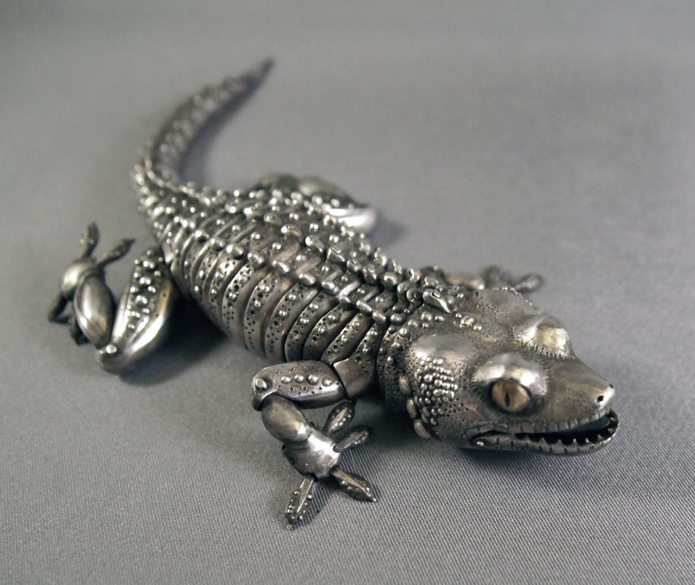 This articulated gecko in sterling silver, with 60 movable parts, was designed and handmade by artist Oleg Konstantinov. A selection of the artist's animals will be featured Sept. 28 at Trifles during the Wiscasset Art Walk.
