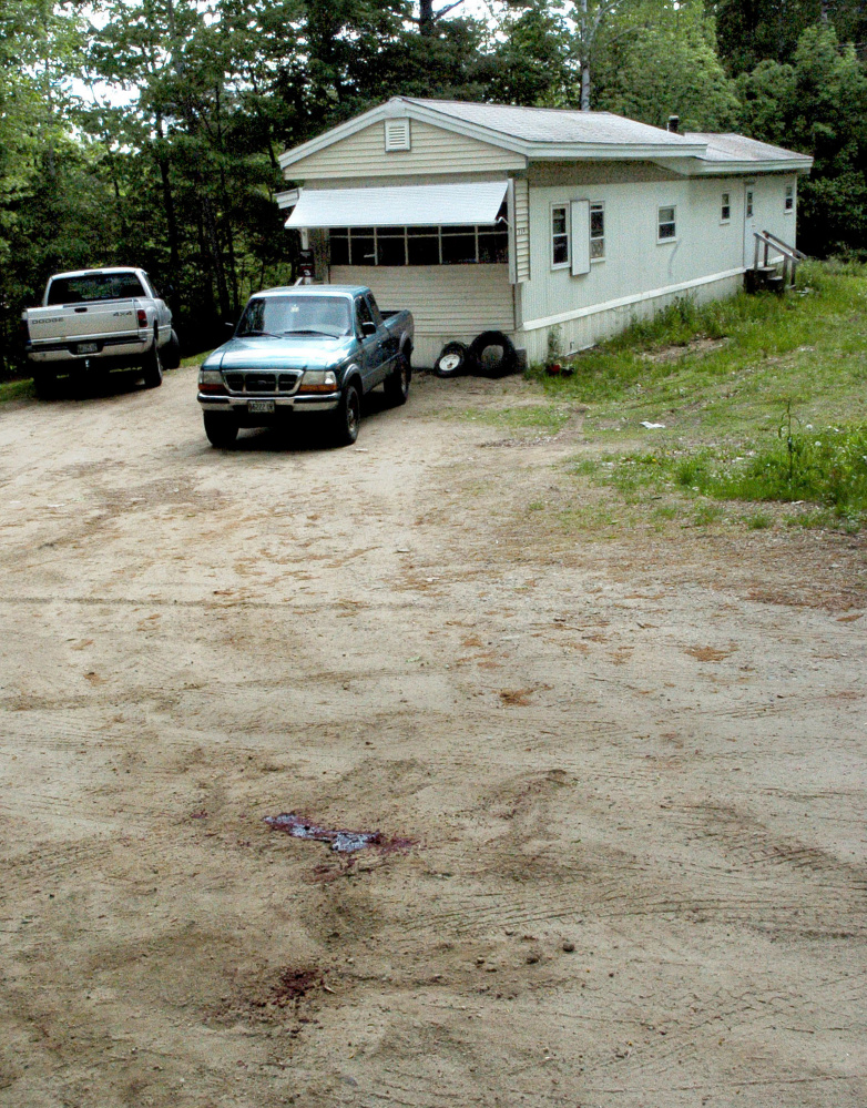 Police investigate the shooting death of Michael Reis of New Sharon at 259 Weld Road in Wilton on June 1, 2016.