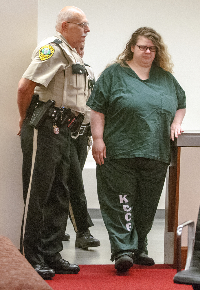 Sarah Conway walks into her sentencing hearing Wednesday at the Capital Judicial Center in Augusta, where she was sentenced to eight years in prison, followed by 18 years on supervised release, for sexually assaulting a young boy.