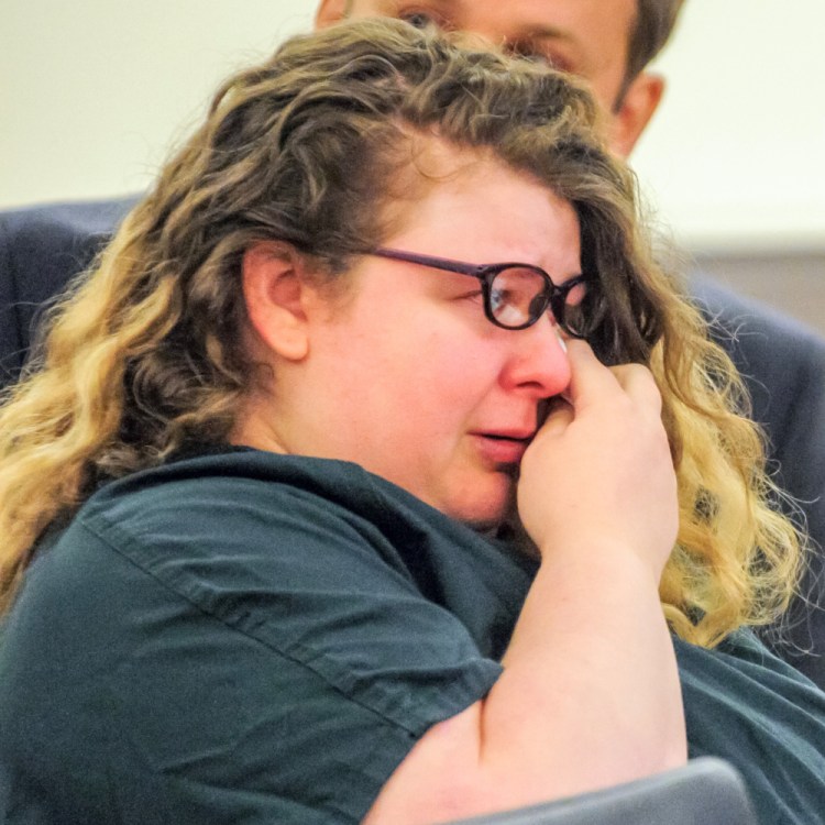 Sarah Conway, 28, wipes away tears in court Wednesday during her sentencing hearing on child sexual assault charges.