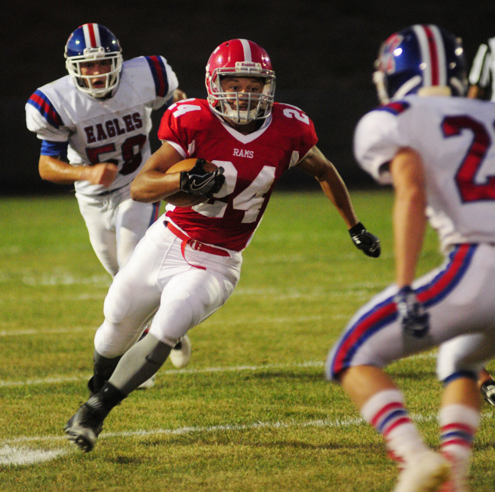 Cony's Jordan Roddy runs the ball during a game against Messalonskee at Alumni Field in Augusta last year.