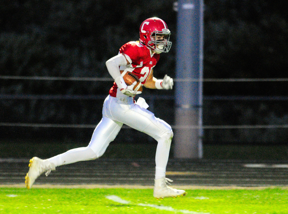 Cony's Elijah Dutil scores a touchdown on a long pass from a flea flicker during a recent game against Falmouth in Augusta.