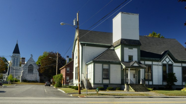 The former St. Mark's Episcopal church, left, stands west of the former Elim church, which is on the northwest corner of Oak and State streets in Augusta.