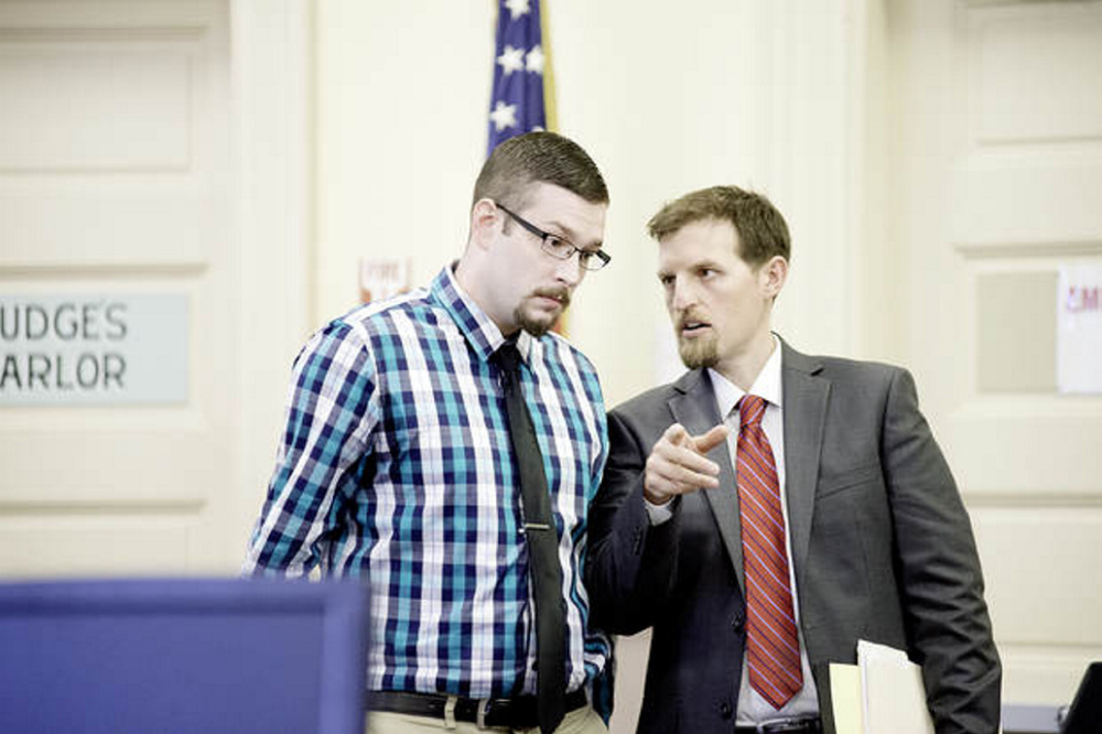 Timothy Danforth, left, talks with his co-counsel Jeffrey Wilson on Monday before the start of Danforth's murder trial in Franklin County Superior Court in Farmington.