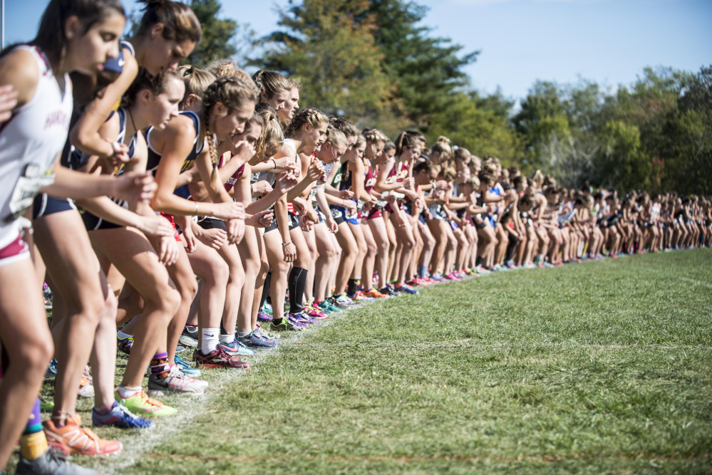Girls from several high school line up at the starting line for the Festival of Champions on Saturday in Belfast.