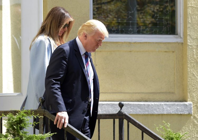 President Donald Trump and first lady Melania Trump leave after attending services at St. John's Church in Washington on Sunday. 
 Susan Walsh/Associated Press