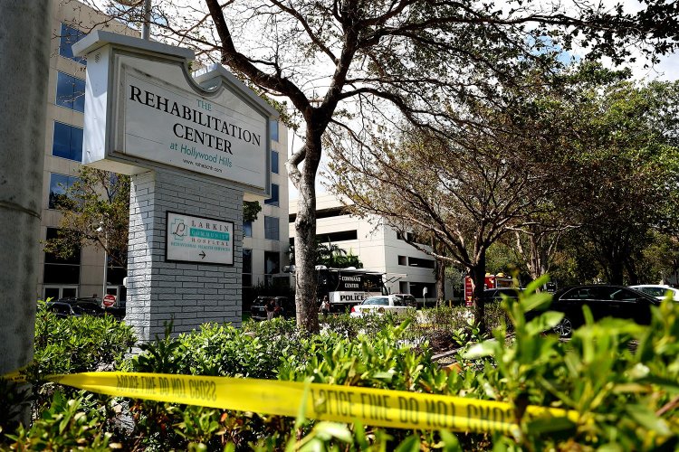 Police tape surrounds the Rehabilitation Center in Hollywood Hills, Fla., which had no air conditioning after Hurricane Irma knocked out power. Eight patients at the sweltering nursing home died, and investigators are trying to determine how conditions deteriorated so quickly.