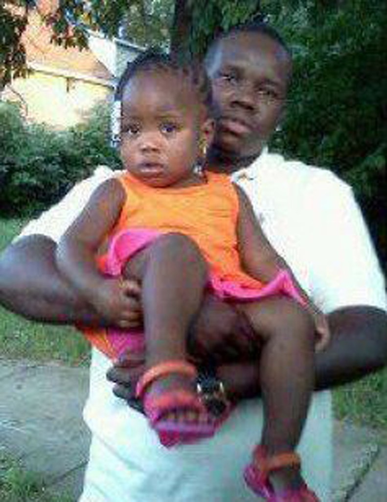 This undated family photo shows Anthony Lamar Smith holding his daughter Autumn Smith.