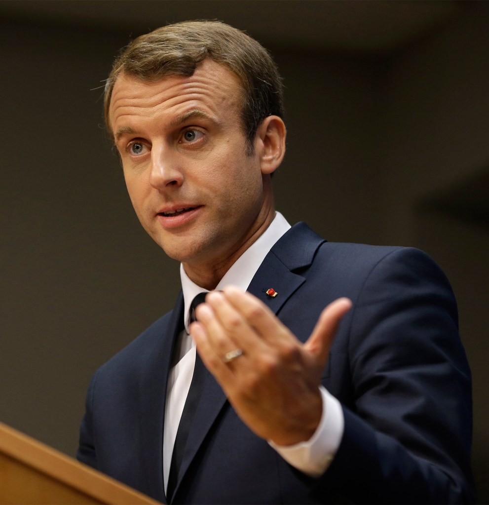 French President Emmanuel Macron, seen Sept. 19 at United Nations headquarters, offered grants to climate scientists as soon as the U.S. announced it would leave the Paris climate accord.