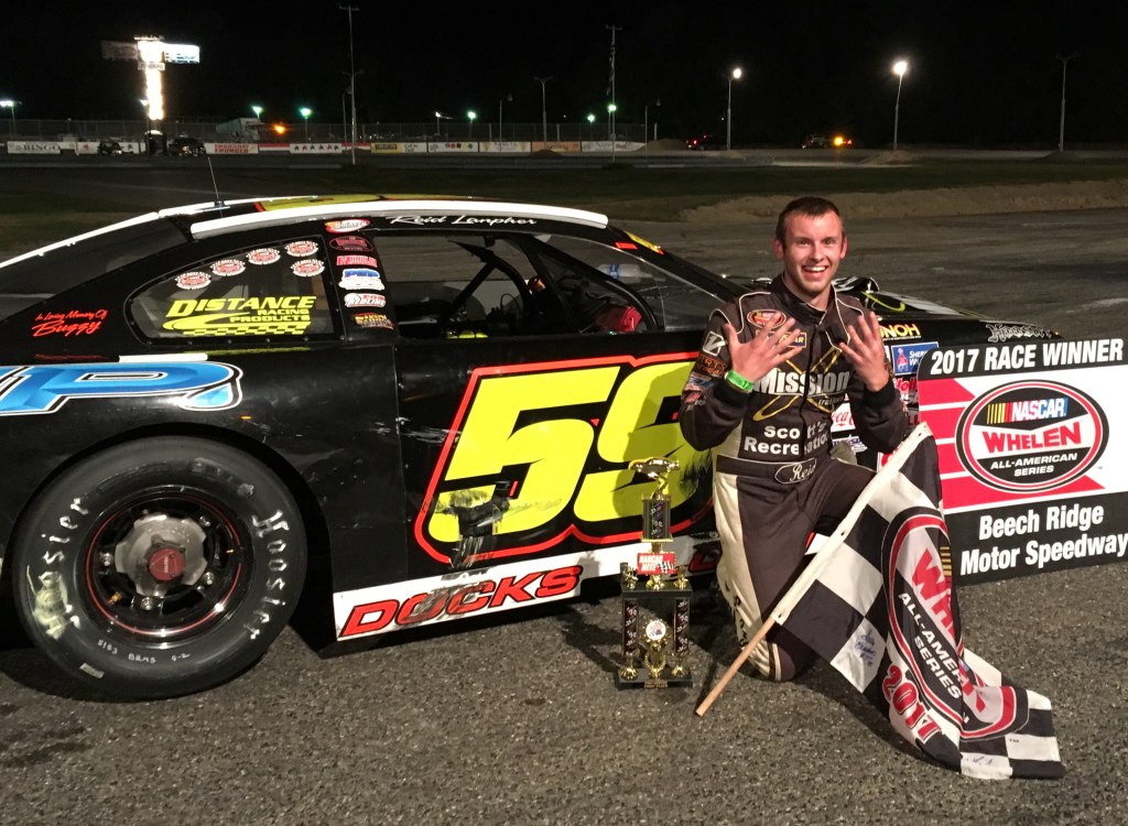Reid Lanpher of Manchester celebrates his ninth win of the season, including his fourth in a row at Beech Ridge Motor Speedway, on Saturday night in Scarborough.