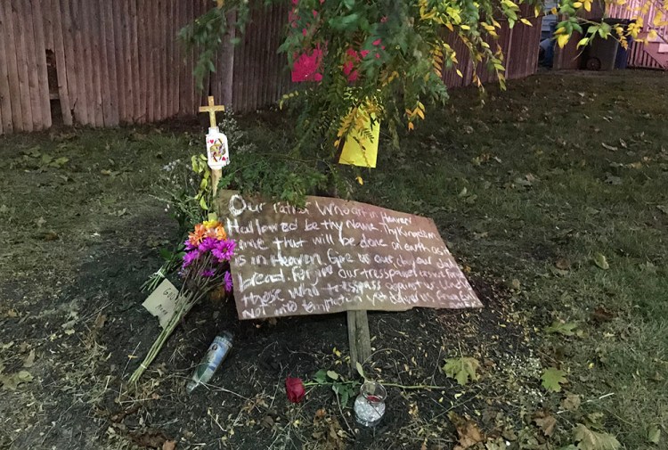 A memorial to Sharon Crawford was set up at the intersection of Stroudwater Street and William Clarke Drive on Wednesday, a day after Crawford was hit by a vehicle and killed at the intersection.