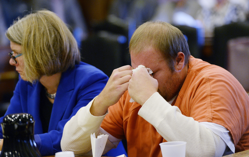Portland, ME - Oct. 2 Joshua McNally wipes away tears after speaking at the Cumberland County Courthouse where he was sentenced in connection to the motor vehicle death of Lake Region Middle School science teacher Adam Perron Monday, October 2, 2017. (Staff photo by Shawn Patrick Ouellette/Staff Photographer)