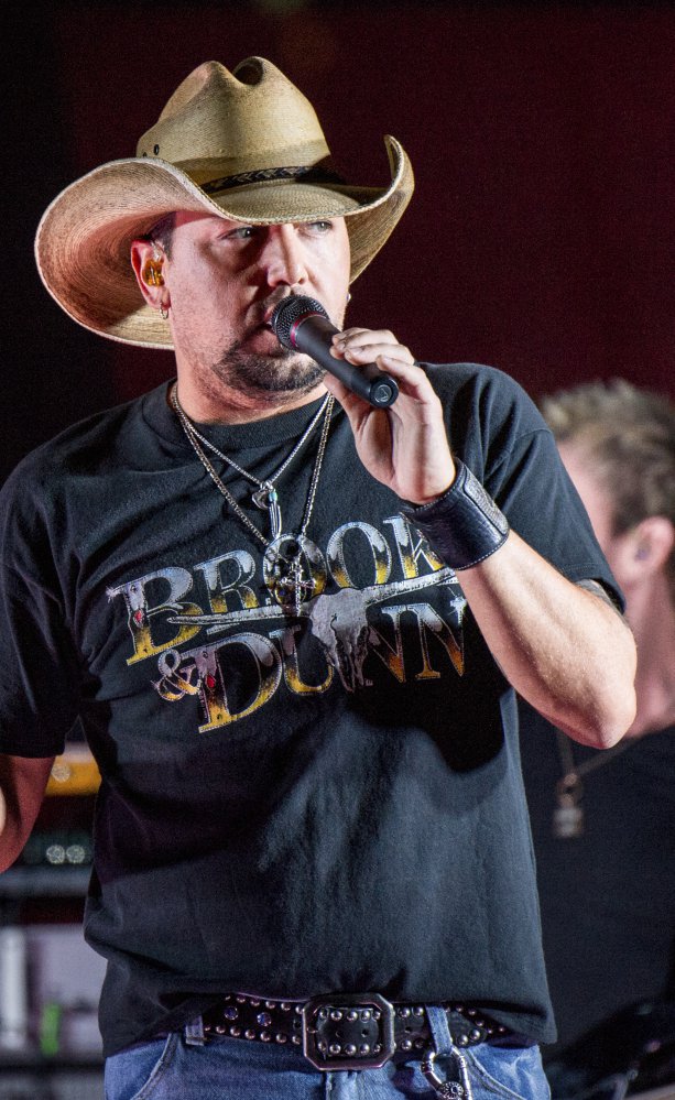 Jason Aldean performs during a surprise pop up concert on June 7 at the Music City Center in Nashville, Tenn. Aldean was the headlining performer when a gunman opened fire at a music festival on the Las Vegas Strip on Sunday, Oct. 1. 