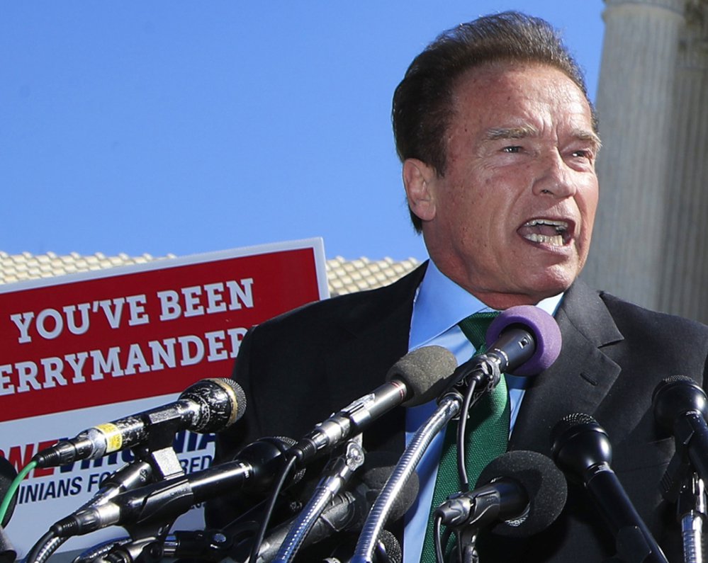 Former California Gov. Arnold Schwarzenegger was one of several speakers at a rally outside the Supreme Court on Tuesday in support of limits on political districts.