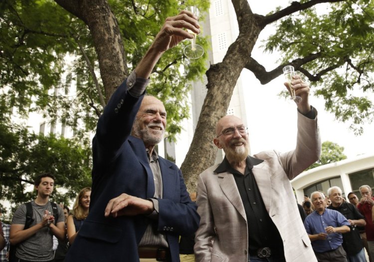 Barry Barish, left, and Kip Thorne, both of the California Institute of Technology, share a toast Tuesday to celebrate winning the Nobel Prize in Physics.