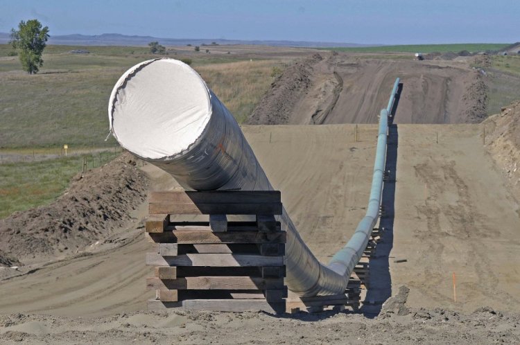 A federal judge ruled Wednesday that the Dakota Access oil pipeline, shown during construction in North Dakota last year, can continue operating while a study is completed to assess its environmental impact on the Standing Rock Sioux.