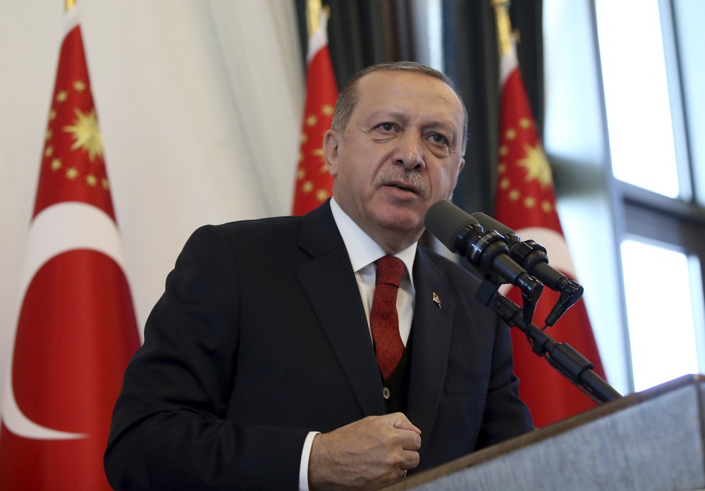 Turkey's President Recep Tayyip Erdogan addresses the country's governors at his palace in Ankara, Turkey, Thursday, Oct. 12, 2017. Erdogan lashed out against the United States for "sacrificing ties" by standing behind its ambassador in Turkey whom he blames for a diplomatic spat that resulted in the two countries' mutually halting visa services for visitors.( Presidential Press Service, pool photo via AP)